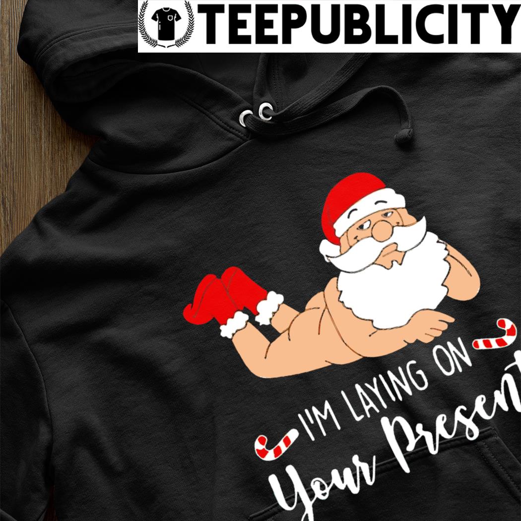 https://images.teepublicity.com/2022/12/funny-santa-im-laying-on-your-present-xmas-shirt-hoodie.jpg