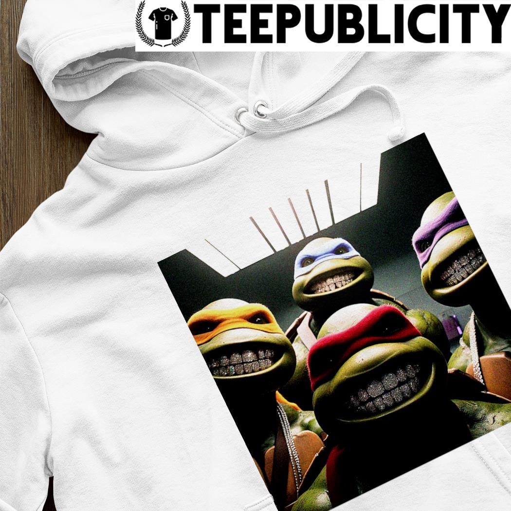https://images.teepublicity.com/2023/12/Teenage-Mutant-Ninja-Turtles-Grillz-selfie-art-hoodie.jpg